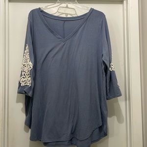 Size 3X shirt with sleeve detail.